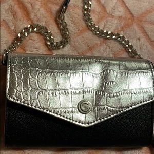 Black and silver cross body .